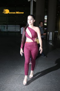 Urfi Javed in a crimson color dress shows off glamour at Airport