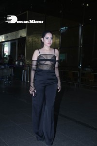 Urfi Javed in a rare black dress at Mumbai airport on November 22
