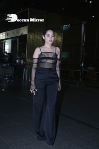 Urfi Javed in a rare black dress at Mumbai airport on November 22