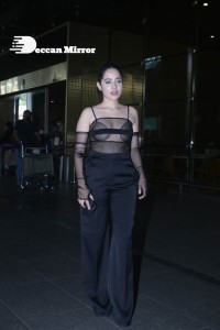 Urfi Javed in a rare black dress at Mumbai airport on November 22
