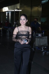 Urfi Javed in a rare black dress at Mumbai airport on November 22