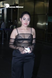 Urfi Javed in a rare black dress at Mumbai airport on November 22