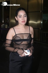 Urfi Javed in a rare black dress at Mumbai airport on November 22