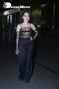 Urfi Javed in a rare black dress at Mumbai airport on November 22
