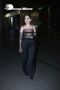 Urfi Javed in a rare black dress at Mumbai airport on November 22