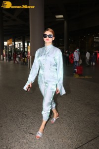 Urvashi Rautela in a blue dress at the Airport