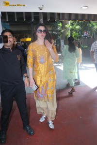 actress urvashi rautela in a shiny yellow dress