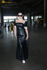 actress and model urvashi rautela stunning looks in a black dress at mumbai airport