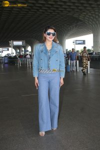 actress Urvashi Rautela in denim jacket and jeans