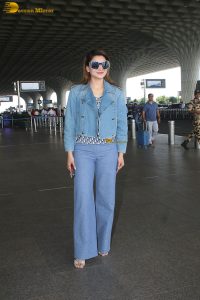 actress Urvashi Rautela in denim jacket and jeans
