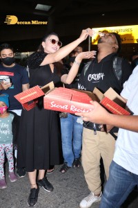 Urvashi Rautela celebrates her Birthday at Airport with Photographers