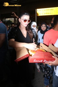 Urvashi Rautela celebrates her Birthday at Airport with Photographers