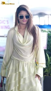 actress urvashi rautela beautiful looks in a white dress at mumbai airport
