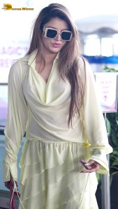 actress urvashi rautela beautiful looks in a white dress at mumbai airport