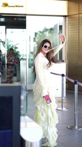 actress urvashi rautela beautiful looks in a white dress at mumbai airport