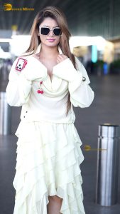 actress urvashi rautela beautiful looks in a white dress at mumbai airport