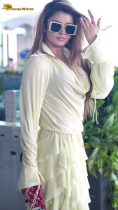 actress urvashi rautela beautiful looks in a white dress at mumbai airport