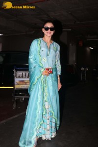 Actress Urvashi Rautela in a green salwar kameez dress at the Airport