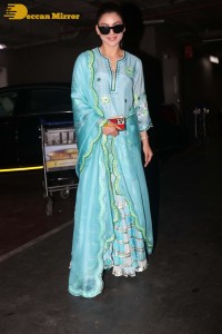 Actress Urvashi Rautela in a green salwar kameez dress at the Airport