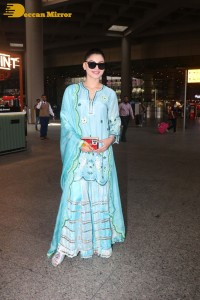 Actress Urvashi Rautela in a green salwar kameez dress at the Airport