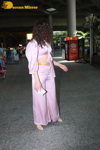 Urvashi Rautela in a Pink Dress at the Airport