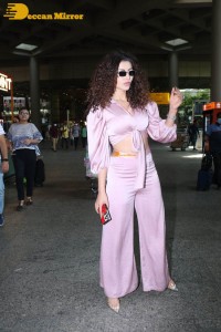 Urvashi Rautela in a Pink Dress at the Airport