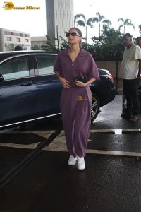 actress vaani kapoor stylish in purple dress at airport
