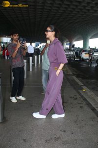 actress vaani kapoor stylish in purple dress at airport