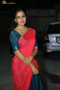 actress Vaishnavi Chaitanya beautiful in a red half saree