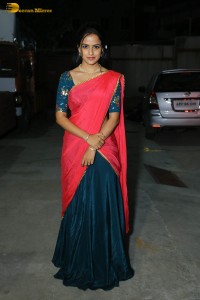 actress Vaishnavi Chaitanya beautiful in a red half saree