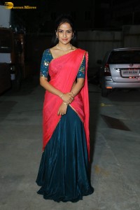 actress Vaishnavi Chaitanya beautiful in a red half saree