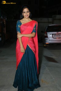 actress Vaishnavi Chaitanya beautiful in a red half saree