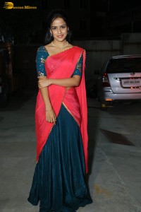 actress Vaishnavi Chaitanya beautiful in a red half saree