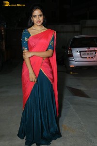 actress Vaishnavi Chaitanya beautiful in a red half saree