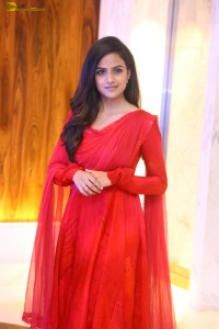 actress vaishnavi chaitanya cute looks in a red salwar kameez dress