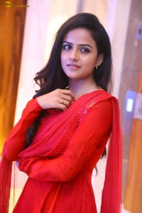 actress vaishnavi chaitanya cute looks in a red salwar kameez dress