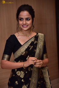 actress vaishnavi chaitanya sweet looks in a black saree