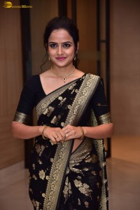 actress vaishnavi chaitanya sweet looks in a black saree