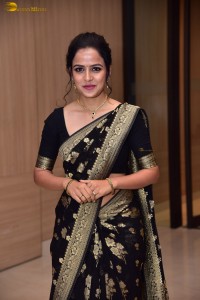 actress vaishnavi chaitanya sweet looks in a black saree