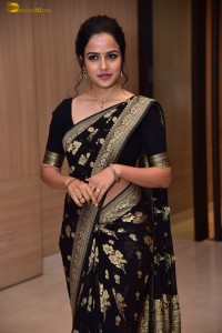 actress vaishnavi chaitanya sweet looks in a black saree
