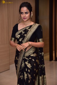 actress vaishnavi chaitanya sweet looks in a black saree