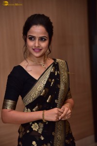 actress vaishnavi chaitanya sweet looks in a black saree