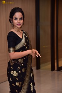 actress vaishnavi chaitanya sweet looks in a black saree