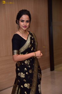 actress vaishnavi chaitanya sweet looks in a black saree