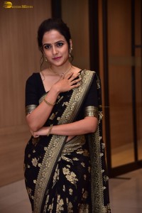 actress vaishnavi chaitanya sweet looks in a black saree
