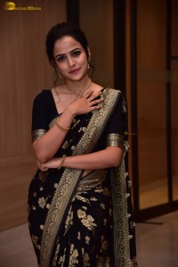 actress vaishnavi chaitanya sweet looks in a black saree