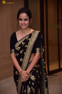 actress vaishnavi chaitanya sweet looks in a black saree