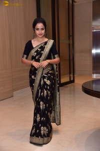 actress vaishnavi chaitanya sweet looks in a black saree