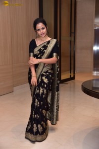 actress vaishnavi chaitanya sweet looks in a black saree
