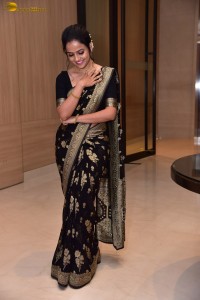 actress vaishnavi chaitanya sweet looks in a black saree